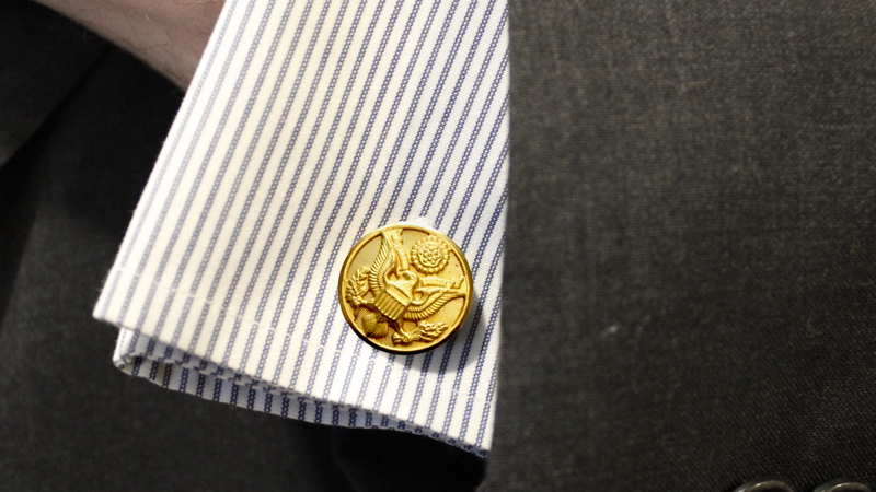 Gold Army Button Cufflinks on a Gray and white dress shirt
