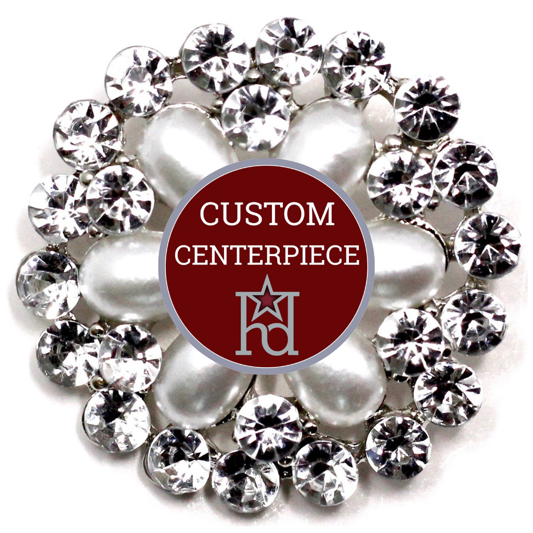 Decorative centerpiece with pearls and crystals on a white background
