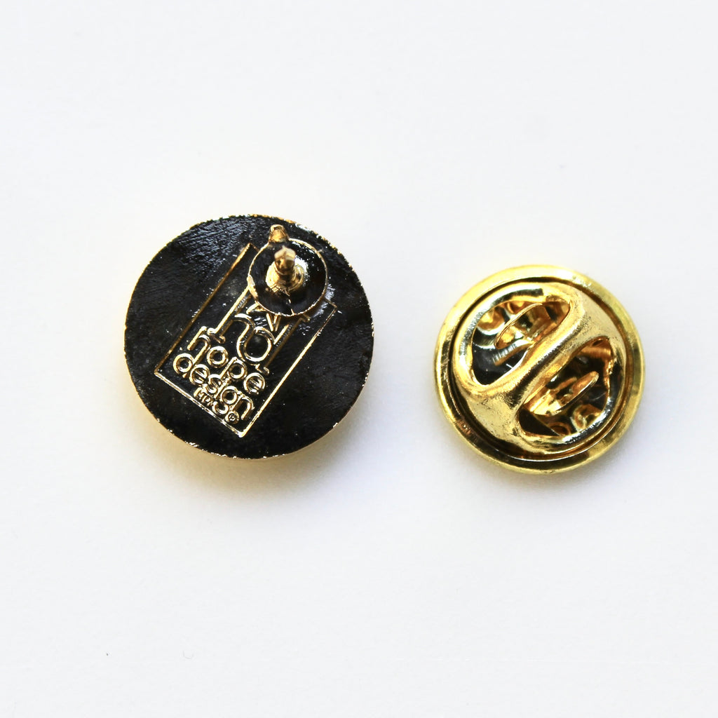 back of lapel pin in gold with clutch backing
