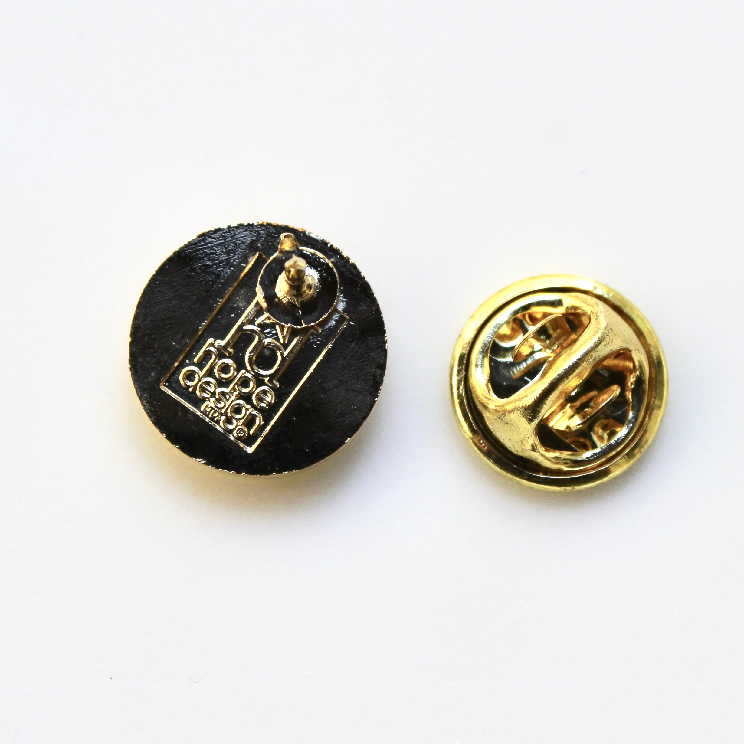 back of lapel pin in gold with clutch backing
