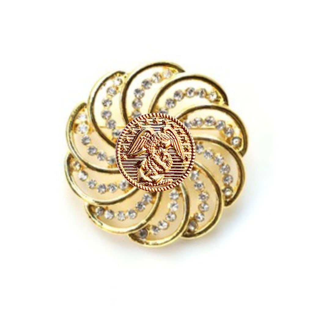 Gold brooch with gemstones and Marines inspired centerpiece on a white background