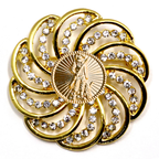 Gold brooch with National Guard design and gemstones on a white background