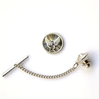 Silver tie pin with chain on a white background