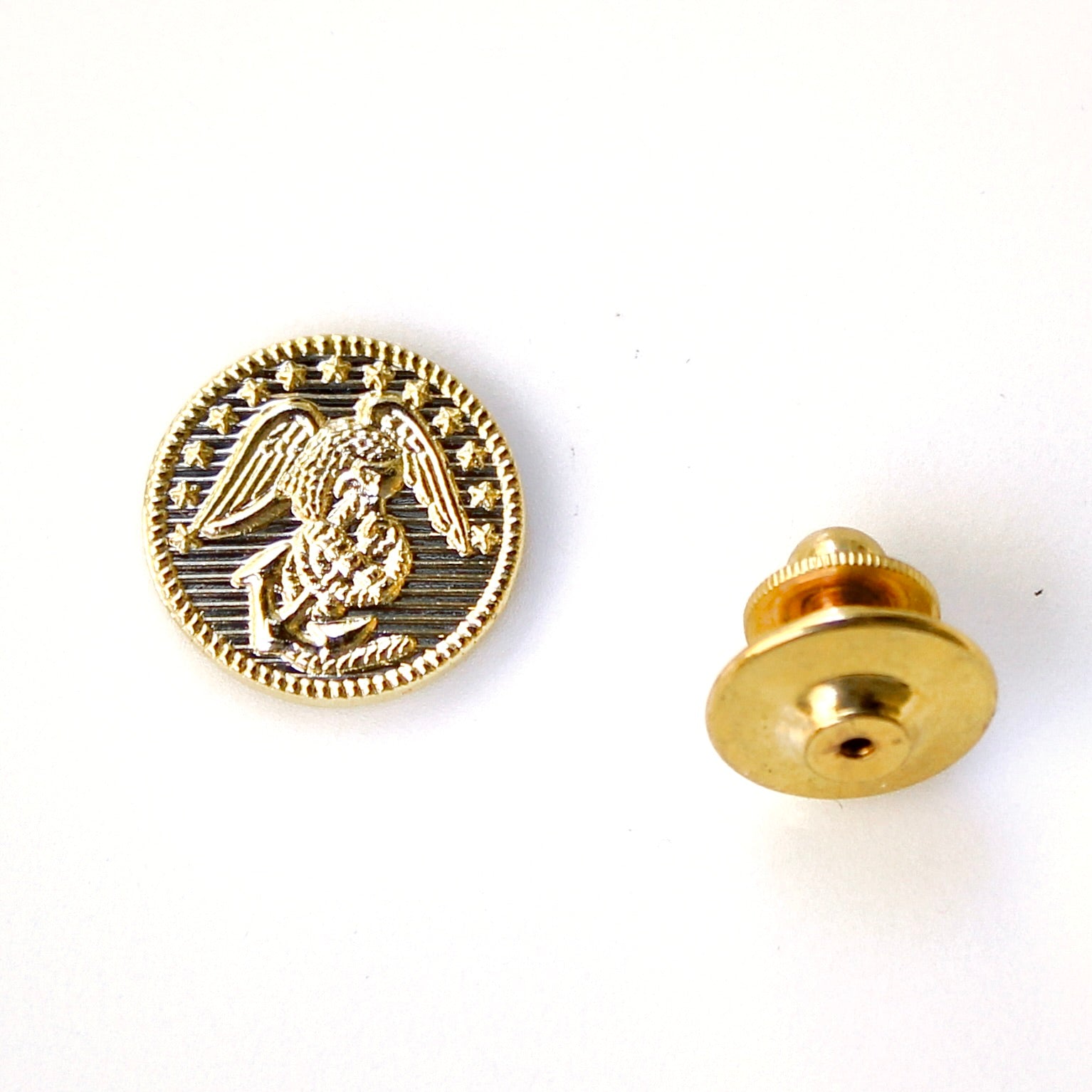 Gold coin with an eagle design on a white background