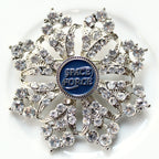 Decorative brooch with 'Space Force' emblem on a white background