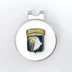 A golf hat clip featuring the 101st Airborne Division insignia with an eagle motif, primarily in green, yellow, and black colors.