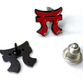 A collection of three lapel pins featuring the 187th Airborne Infantry Regiment 'Rakkasans' insignia. One pin has a red and black design with a clutch back, another has a vintage spring-loaded clutch back, and the third is a basic clutch back in black.