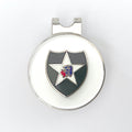 A silver golf hat clip featuring the 2nd Infantry Division insignia with a black shield, a white star, and an Indian's head with war bonnet in profile.