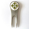A silver golf divot tool with a magnetic ball marker featuring the 4th Infantry Division insignia centerpiece.