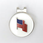 A golf hat clip and ball marker with an American flag design.