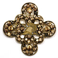 A brooch with a tan spartan helmet centerpiece and crystal rhinestones, featuring a cross shaped design.