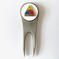 A silver golf divot tool with a magnetic ball marker featuring the 1st Armored Division insignia