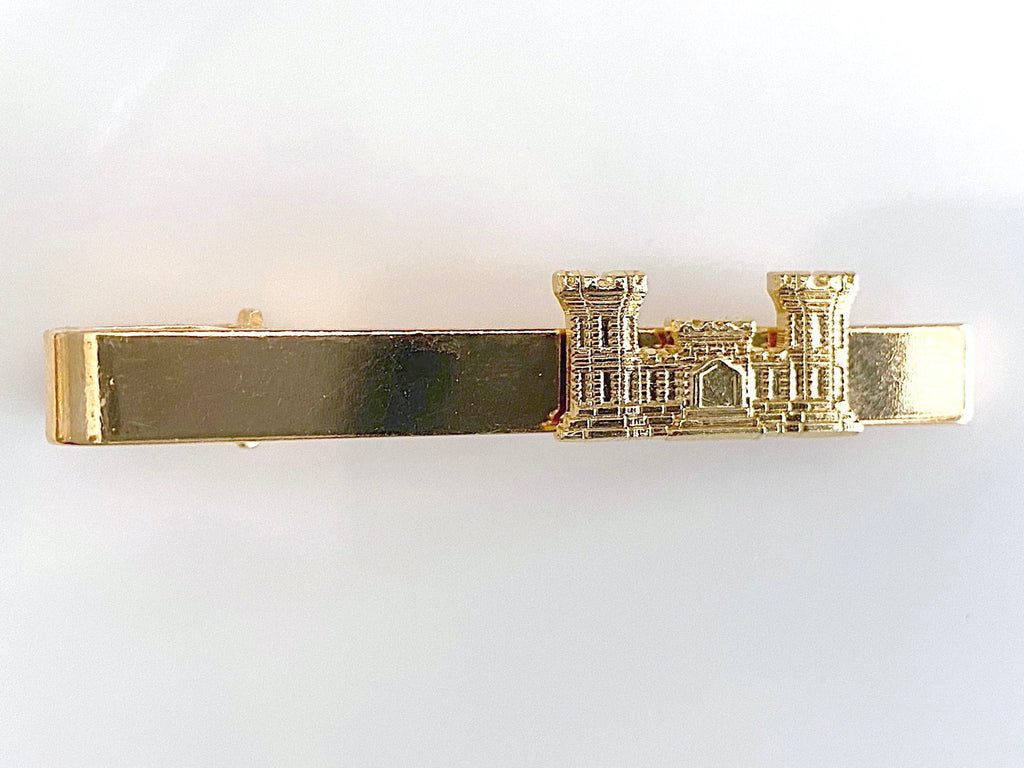 Gold Tie Clip with Engineer Insignia on white background