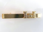 Gold Tie Clip with Engineer Insignia on white background