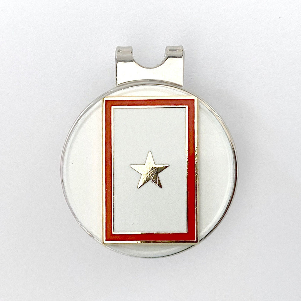 A golf hat clip with a gold star service flag centerpiece in red, white, and blue colors.