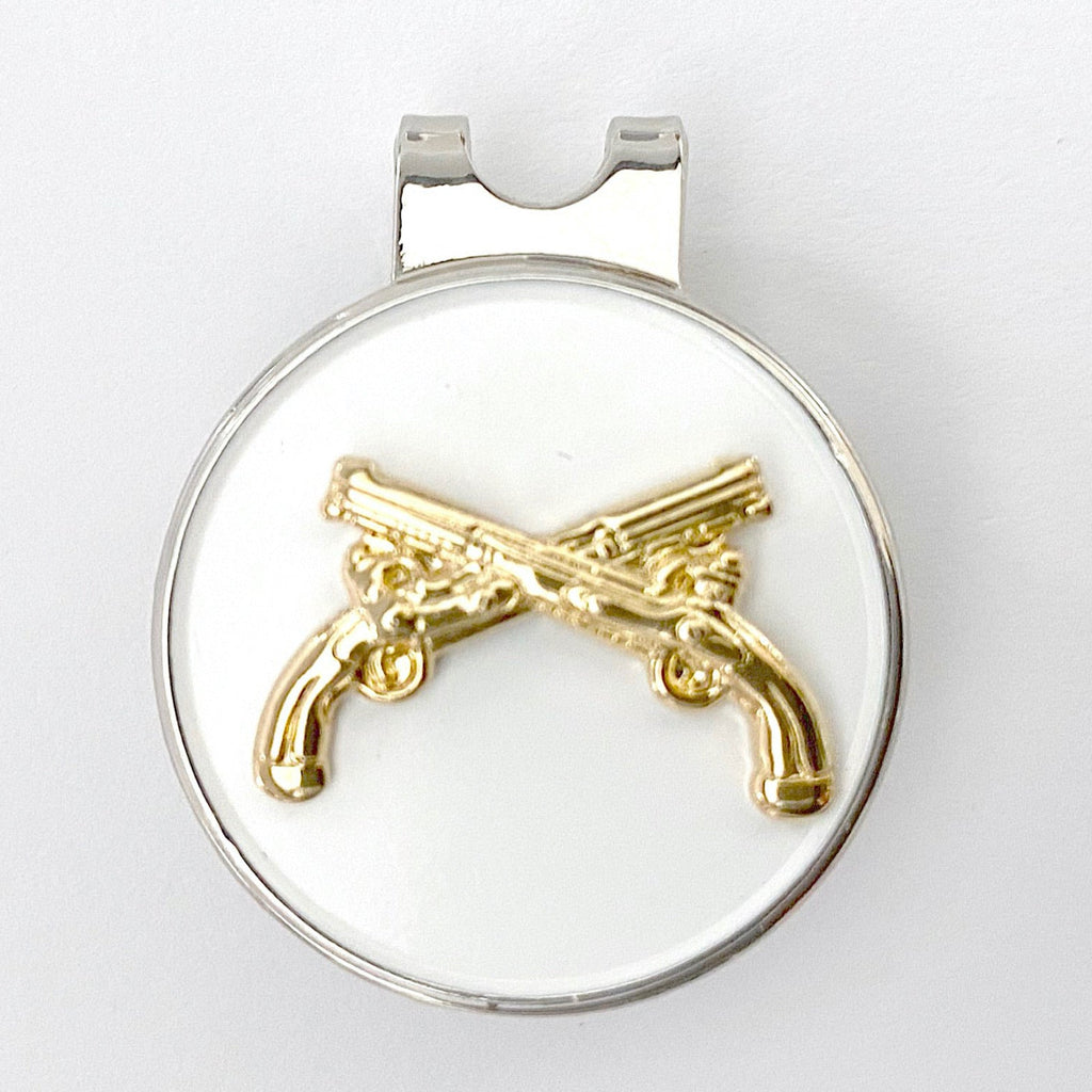 Medal with gold gun design on a white background