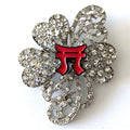 A silver brooch featuring the 187th Airborne Infantry Regiment insignia with red accents and crystal rhinestones.