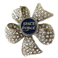 A brooch with a 'Space Force' centerpiece and crystal rhinestones, featuring a military-style design.