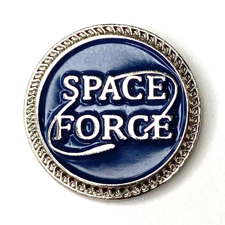 Space Force badge with blue center and silver border on a white background