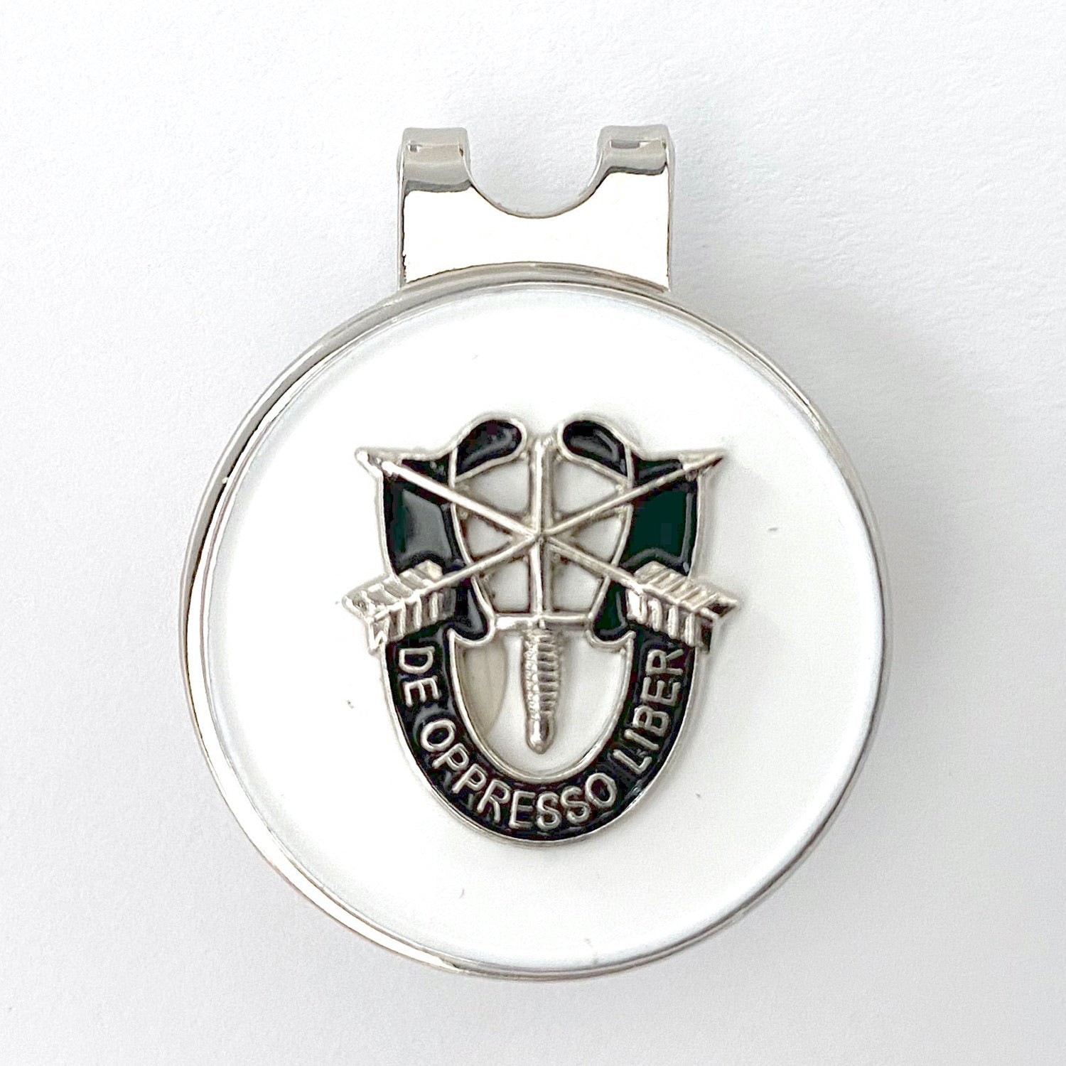 Medal with a design and 'De Oppresso Liber' text on a white background