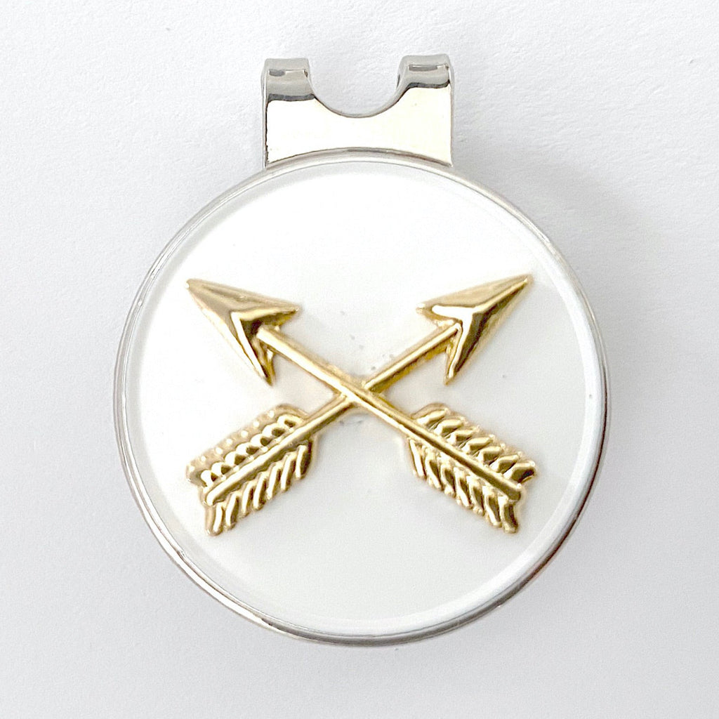 A golf hat clip and ball marker with the Special Forces branch insignia, featuring crossed arrows.