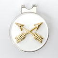 A golf hat clip and ball marker with the Special Forces branch insignia, featuring crossed arrows.