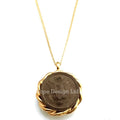 Gold-tone pendant necklace featuring an authentic vintage WWII United States Army soldier uniform button, attached to a gold-tone chain.